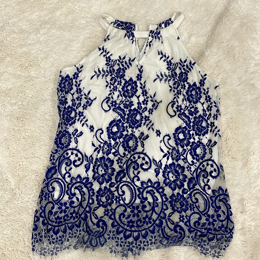 Sleeveless blue and white lace style top, size medium